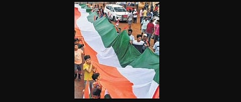 125-ft-long national flag rally held to pay tributes to the revolutionary Alluri Sitaramaraju. (Photo ] Express)