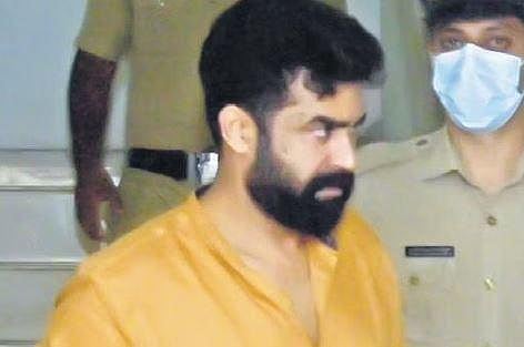 Actor-producer Vijay Babu being taken for quizzing to the Thevara police station on Monday  | A Sanesh