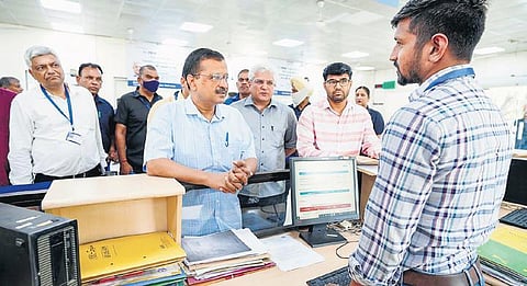 Chief Minister Arvind Kejriwal and Transport Minister Kailash Gahlot at RTO office in  Sarai Kale Khan on Thursday | Pti