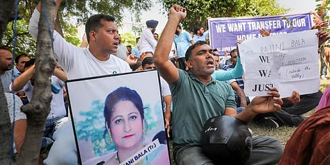 Jammu-based government employees, posted in Kashmir, stage a protest demonstration for their transfer to their home districts, in Jammu, Friday, June 3, 2022. (Photo | PTI)