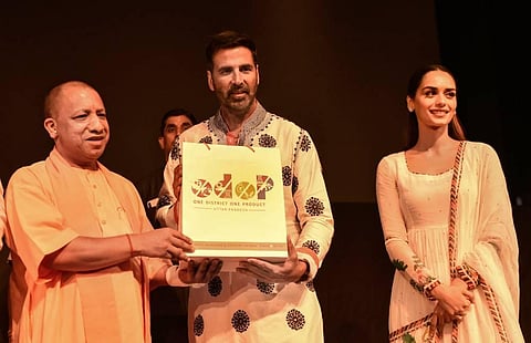 Uttar Pradesh Chief Minister Yogi Adityanath with Bollywood actors Akshay Kumar and Manushi Chhillar after a special screening of the movie 'Samrat Prithviraj'. (Photo | PTI)