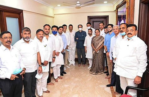 Congress leaders and MLAs meet former Chief Minister and Shiv Sena chief Uddhav Thackeray at his residence Matoshri, in Mumbai. (Photo | PTI)