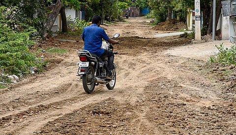 A damaged road at Kalyana Sundaram Nagar in Tiruchy. (Photo | M K Ashok Kumar, ESP)