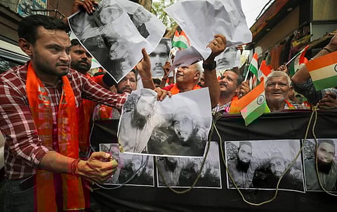 Shiv Sena Dogra Front members stage a protest against the killing of a tailor in Udaipur allegedly over his social media post, in Jammu. (Photo | PTI)