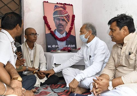 Rajasthan Chief Minister Ashok Gehlot meets family members of tailor Kanhaiya Lal, who was killed by two men allegedly over his social media post, at his residence in Udaipur. (Photo | PTI)