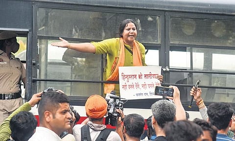 Police detain Vishwa Hindu Parishad and Bajrang Dal activists prior to a protest organised against the tailor’s killing, at Jantar Mantar on Wednesday | Parveen Negi