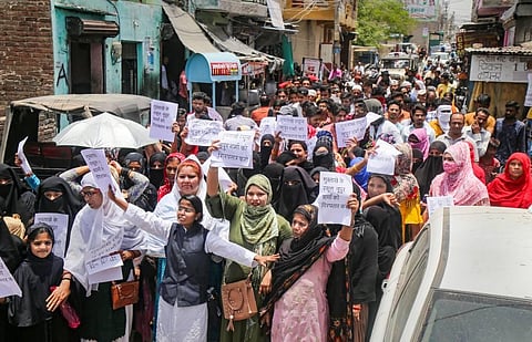 Local Congress Councilor with her supporters during a protest against BJP spokesperson Nupur Sharma over her alleged remarks about Prophet Muhammad. (Photo | PTI)