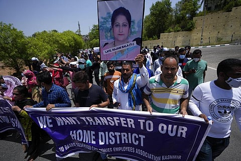 Employees of Jammu and Kashmir Teachers Association shout slogans during a protest against the killing of colleague Rajini Bala in Jammu. (Photo | AP)
