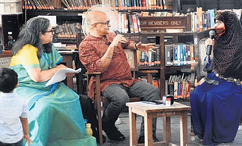 AVIS Viswanathan and Vaani chatting with an author at the Madras Literary Society (Photo | Ashwin Prasath)