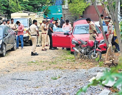 Clues team collects samples and examines the Mercedes at the Jubilee Hills  police station in Hyderabad on Sunday