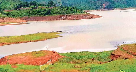 (Top) Receding water levels in the Indravati river   (Below) Deficit rainfall has left arable lands with cracks. (Photo | EPS)