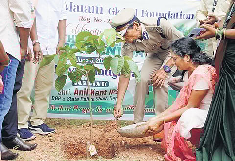 State Police Chief Anil Kant planting a sapling as part of the World Environment Day celebrations organised by Nanmamaram Global Foundation, at the police headquarters in Thiruvananthapuram on Sunday