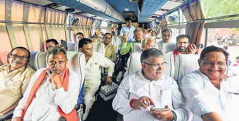 BJP MLAs head to Jamdoli on a bus ahead of the RS elections. (Photo | PTI)