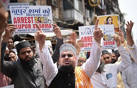 Activists shout slogans as they react to remarks of suspended BJP leader Nupur Sharma on Prophet Muhammad during a protest in Mumbai. (Photo | PTI)