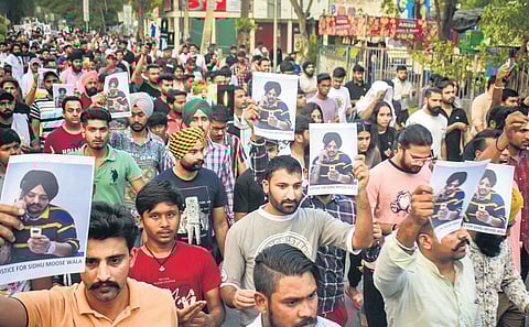 Youth in Haryana take out a candle light march to pay tribute to Moosewala (Photo | PTI)