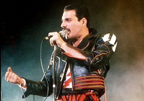In this 1985 file photo, singer Freddie Mercury of the rock group Queen, performs at a concert in Sydney, Australia. (File | AP)