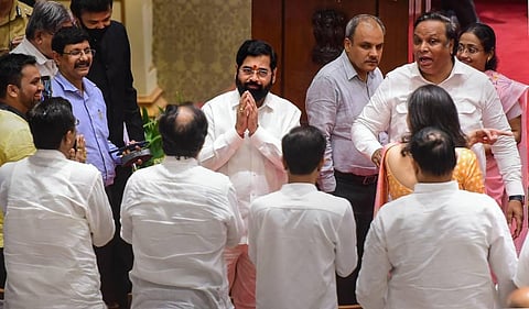 Maharashtra CM and Shiv Sena leader Eknath Shinde arrives for his oath-taking ceremony, at Raj Bhavan in Mumbai. (Photo | PTI)