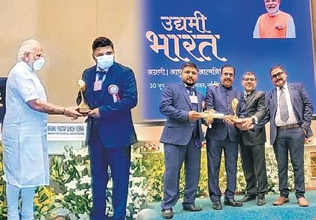 Odisha’s Saferisk Insurance Brokers private limited received the National MSME award 2022 from PM Modi .(Photo | Express)