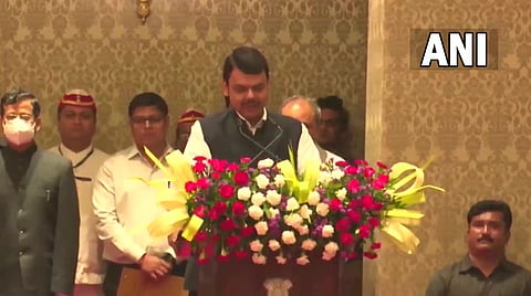 BJP leader Devendra Fadnavis taking oath as the Deputy Chief Minister of Maharashtra on Thursday. (Photo | Twitter/ANI)