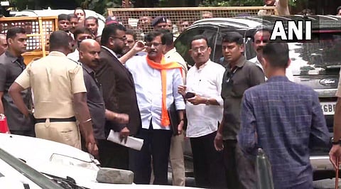 Shiv Sena leader Sanjay Raut arrives at the ED office in Mumbai in connection with the Patra Chawl land scam case. (Photo | ANI/Twitter)