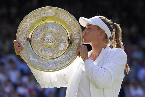 Kazakhstan's Elena Rybakina celebrates after beating Tunisia's Ons Jabeur to win the final of the women's singles of the Wimbledon tennis championships. (Photo | AP)