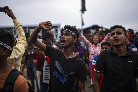Protesters shout slogans at the protest site in Colombo, Sri Lanka, Monday, July 11, 2022. (Photo | AP)