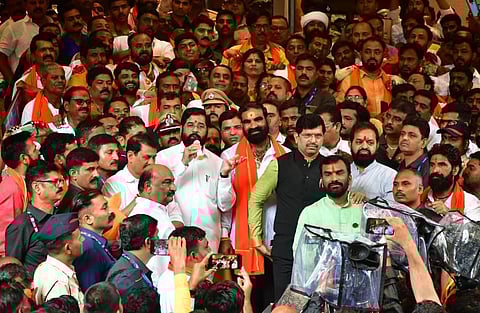Maharashtra CM Eknath Shinde with Shiv Sena MLA Santosh Bangar during his interaction with his supporters, in Mumbai, Tuesday, July 12, 2022.  (Photo | PTI)