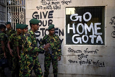 Sri Lanka army soldiers patrol near the official residence of president Gotabaya Rajapaksa three days after it was stormed by anti government protesters in Colombo. (Photo | AP)