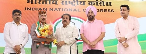 Khimi Ram Sharma joining Himachal Congress. (Photo | ANI Twitter)