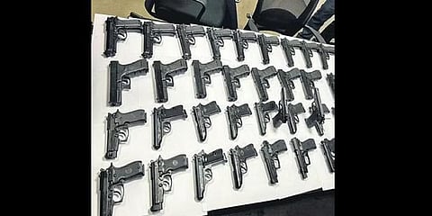 The couple were caught carrying 45 handguns with them