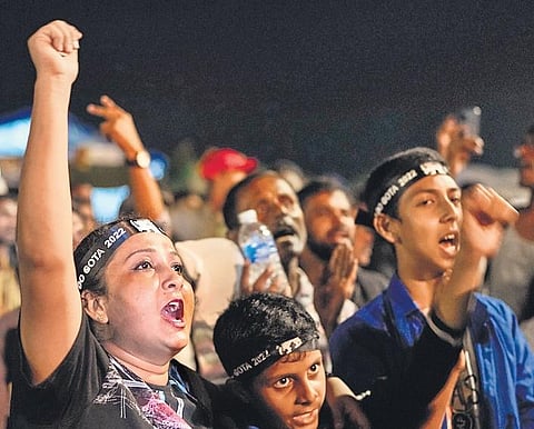 Protesters celebrate the resignation of Gotabaya Rajapaksa in Colombo | AFP