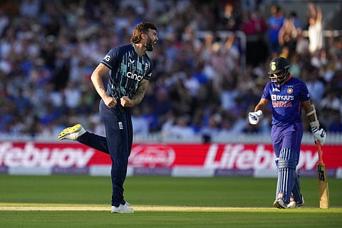 England's Reece Topley celebrates taking the wicket of India's Mohammed Shami, right, during the second one day international cricket match. (Photo | AP)