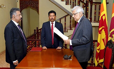 In this photograph provided by the Sri Lankan President's Office, Ranil Wickremesinghe takes oath as the interim President in Colombo, Sri Lanka, on July 15, 2022. (Photo | AP)