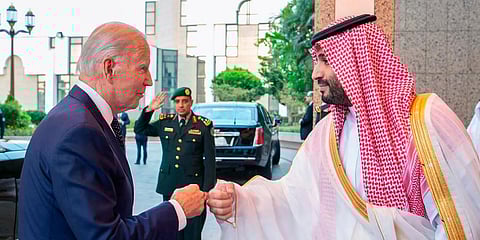 Saudi Crown Prince Mohammed bin Salman, right, greets President Joe Biden, with a fist bump after his arrival in Jeddah, Saudi Arabia. (Photo | AP)