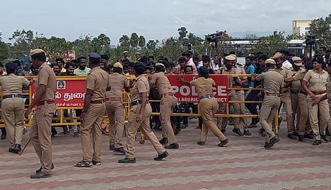 Police try to stop rioters from entering the premises of a private residential school in Kaniyamoor near Chinnasalem in Tamil Nadu's Kallakurichi district. A Class 12 girl was found dead in the hostel