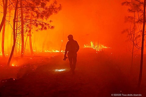 Firefighters battled wildfires raging out of control in France and Spain on Sunday as Europe wilted under an unusually extreme heat wave. (Photo |AP)