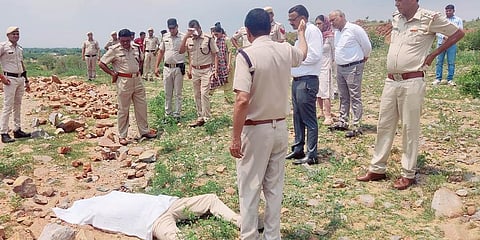 Police personnel at the crime scene after DSP Surender Singh Bishnoi was allegedly mowed down to death by the mining mafia. (Photo | PTI)