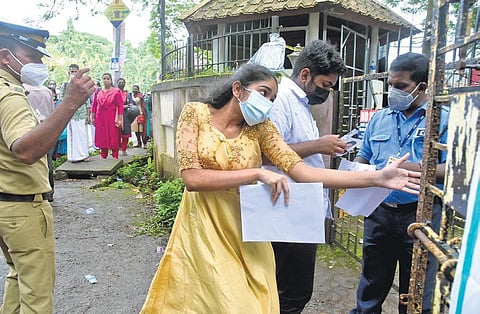 A NEET aspirant enters the examination centre at the Kendriya Vidyalaya at Kadavanthra. (Photo | A Sanesh, EPS)