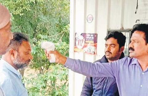 With two monkeypox cases detected in Kerala, Mysuru district health staffers led by HD Kote taluk health officer T Ravikumar screen people at Bavali checkpost