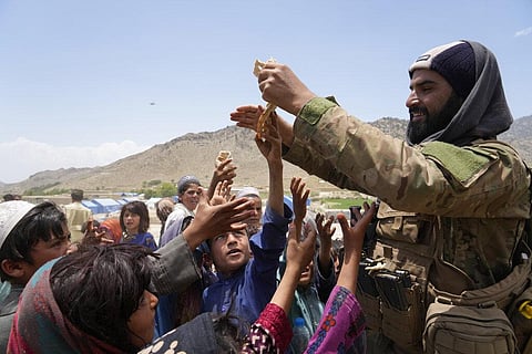 Afghans receive aid at a camp after an earthquake in Gayan district in Paktika province, Afghanistan. (Photo | AP)