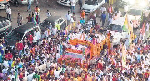 Supporters welcome BJP national president JP Nadda to the city in Shamshabad, on Friday. (Photo | vinay Madapu, EPS)