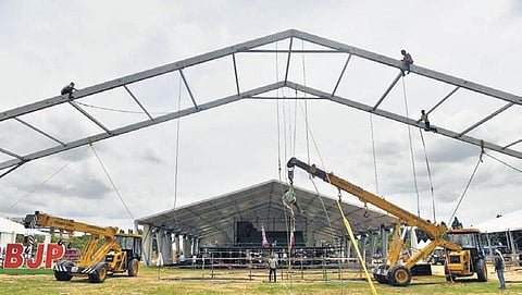 Workers carry out arrangements for PM Modi’s meeting at Parade Ground in Secunderabad, on Friday | vinay Madapu