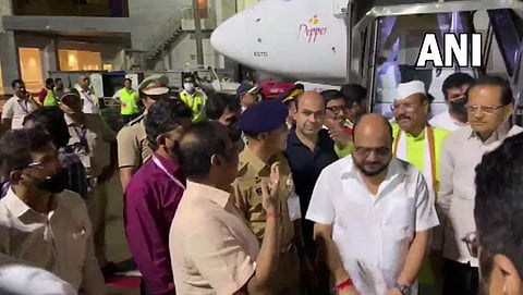 Rebel Sena MLAs at Mumbai airport after their landing on Saturday. (Photo | EPS)