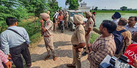 Punjab Police personnel at the site of an encounter in which two gangsters Jagroop Singh Roopa and Manpreet Singh, suspected to be involved in killing of singer Sidhu Moose Wala. (Photo | PTI)