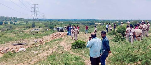 Police personnel at the crime scene after DSP Surender Singh Bishnoi was allegedly mowed down to death by the mining mafia. (Photo | PTI)