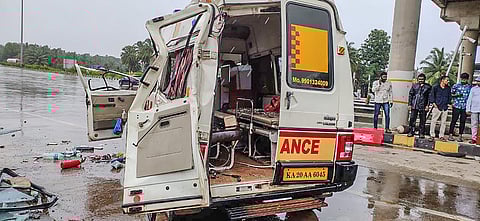 A damaged ambulance following its collision with the Shirur toll booth after the driver lost control of the vehicle, in Udupi district, on July 20, 2022. (Photo | PTI)
