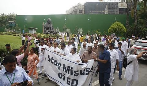 Congress MPs protesting in support of Congress President Sonia Gandhi before her appearance in ED at Parliament House in New Delhi on Thursday.  (Photo | Shekhar Yadav/EPS)