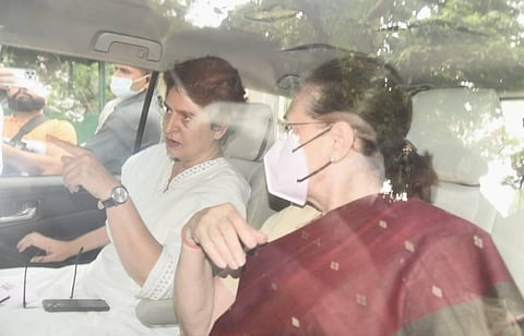 Congress interim president Sonia Gandhi, accompanied by her daughter Priyanka, leaves her residence for the ED office in New Delhi on Thursday. (Photo |Parveen Negi/EPS)