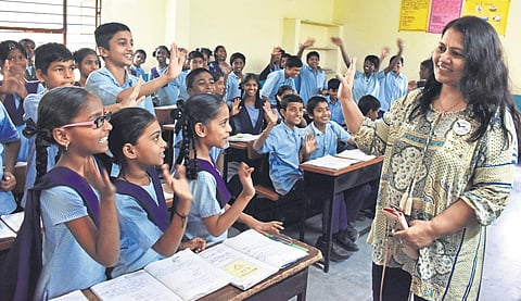A volunteer teaching a class, S. Senbagapandiyan