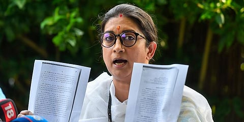 Union Minister Smriti Irani addresses a press conference at her residence in New Delhi. (Photo | PTI)